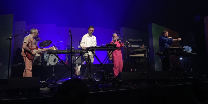 A live band on stage featuring a keyboard and microphone, ideal for couples seeking entertainment in Fort Lauderdale.