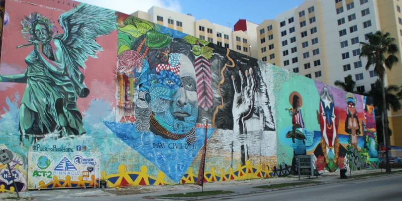 A striking street mural in Broward County, featuring bold colors and artistic expression, representing local art culture in Fort Lauderdale.