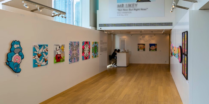 An art gallery filled with bright, colorful paintings, part of the family-friendly activities at NSU Art Museum in Fort Lauderdale.