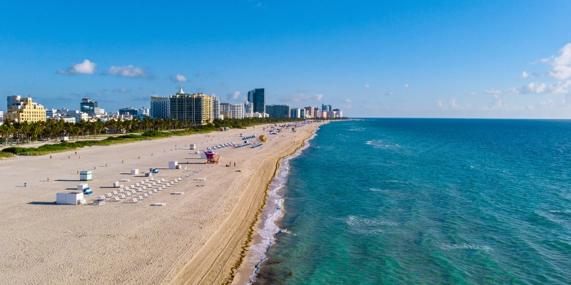 Scenic view of Miami's skyline over the beach, emphasizing the allure of Fort Lauderdale Beach Park.